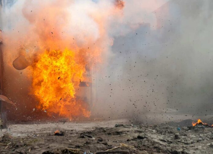shutterstock_2144326471.jpg featured image A large explosion with flames and smoke.