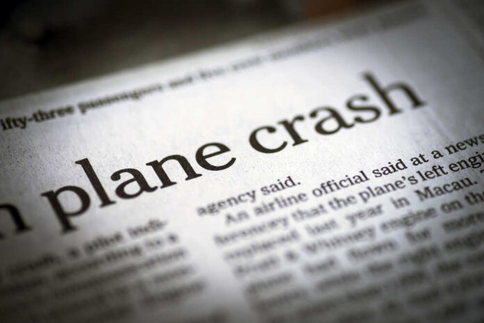 shutterstock_290501621.jpg featured image Newspaper headline about a plane crash.