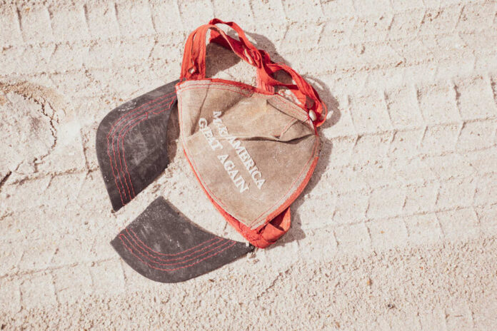 shutterstock_1891634956.jpg featured image MAGA torn cap.