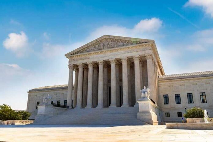 shutterstock_2088295624.jpg featured image U.S. Supreme Court building exterior under blue sky.