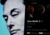 Elon Musk's profile on mobile screen, blurred background face.