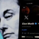 Elon Musk’s TRANS CHILD Makes WEIRD MOVE – WATCH Elon Musk's profile on mobile screen, blurred background face.