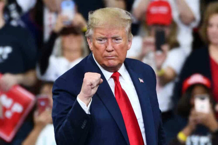 shutterstock_1585235176-1.jpg Donald Trump raising his fist