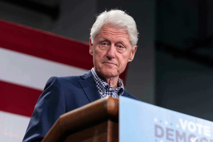 shutterstock_2222838089.jpg Bill Clinton speaking at podium