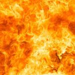 Bright orange and yellow flames burning intensely.