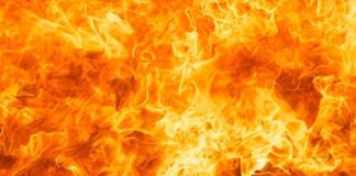 Bright orange and yellow flames burning intensely.