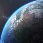 INTERSTELLAR OBJECT RACING TOWARD EARTH!? Earth from space with sun in background.