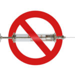 A syringe with a red prohibition sign overlay