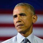 Barack Obama in front of flag
