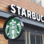COFFEE CHAOS: Dress Code Uproar Hits Starbucks Starbucks cafe exterior with logo and sign