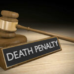 Trump’s Death Penalty Demand Has Conservatives Cheering Gavel beside death penalty sign on desk
