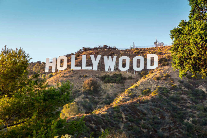 Hollywood sign on a sunny hillside.