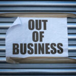 Iconic Business COLLAPSES — American Institution DESTROYED Out of Business sign on closed store shutters