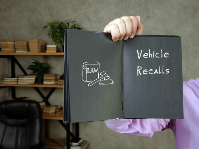 Book with Vehicle Recalls and law symbol