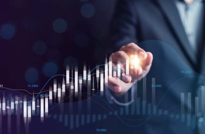 Business professional interacting with a digital financial graph