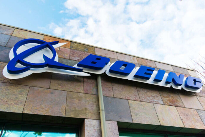Boeing logo on building with cloudy sky background