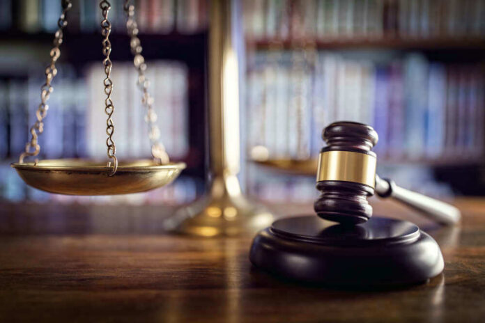 Scales and gavel on a judges desk.