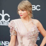Plot EXPOSED — Taylor Swift Fans Seconds From MASSACRE Taylor Swift in ornate dress.