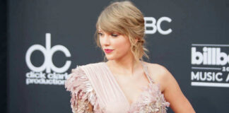 Taylor Swift in ornate dress.