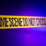 MASS SHOOTING: Brawl Explodes Into Gunfire Yellow crime scene tape with the words 'CRIME SCENE DO NOT CROSS'