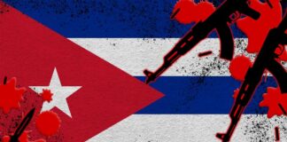 Artistic representation of the Cuban flag with guns and red splashes