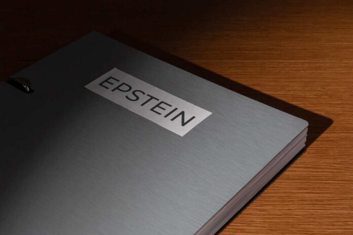 Close-up of a metallic binder labeled 'EPSTEIN'