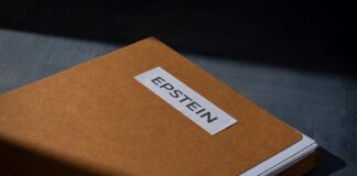 A brown folder with a label reading 'EPSTEIN'