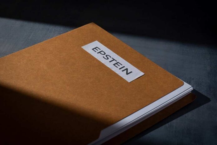 A brown folder with a label reading 'EPSTEIN'