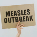 Measles Outbreak Explodes in Texas Migrant Camp Measles outbreak sign