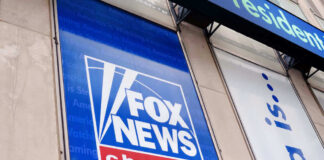 Fox News channel sign on building exterior.