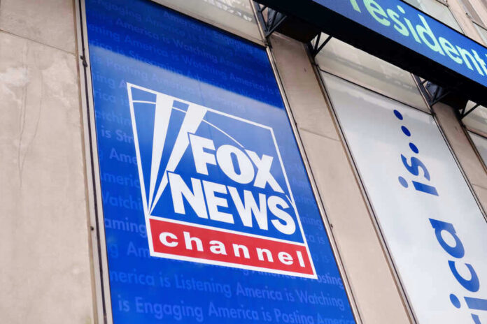 Fox News channel sign on building exterior.