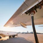 Jet Fuel SOARS – Airfares About to Explode?! Fueling an aircraft at the airport with a hose connected to the wing