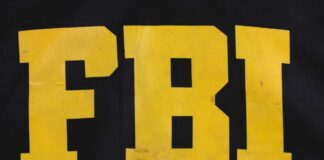 FBI logo displayed in large yellow letters on a black background