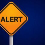 Orange alert sign with the word 'ALERT' displayed prominently