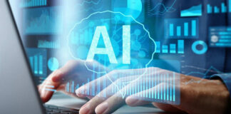 Person typing on laptop with AI hologram