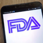 Close-up of a smartphone displaying the FDA logo