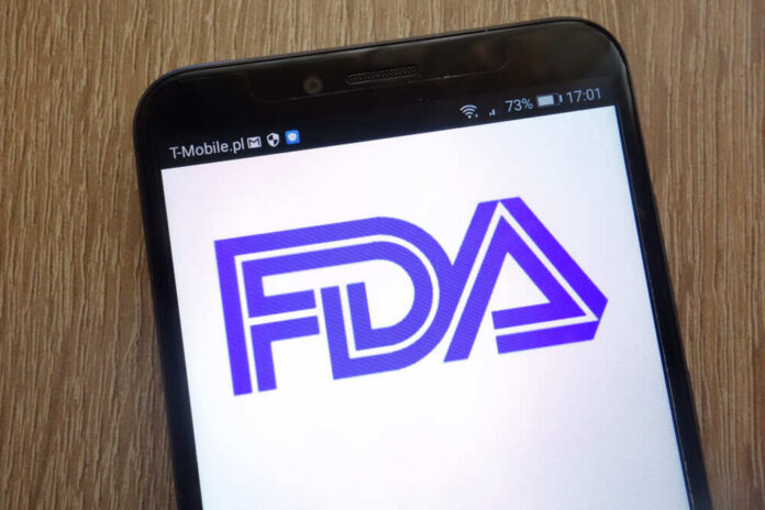 Close-up of a smartphone displaying the FDA logo