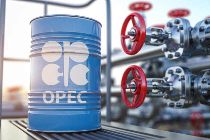 Blue oil barrel with OPEC logo next to industrial valves