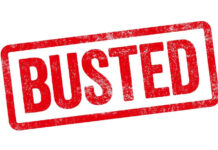 Red Busted stamp on white background