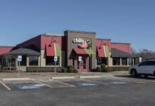 Exterior view of a Chili's restaurant with a parking lot