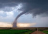 Tornado Destroys Homes — A Miracle Nobody Died Tornado touching down in an open field area.