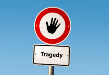 Unbelievable Tragedy: Fatal Incident Raises Questions Red tragedy stamp on white background