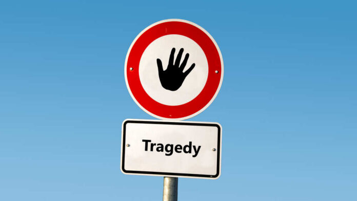 Street,Sign,The,Direction,Way,To,Comedy,Versus,Tragedy Red tragedy stamp on white background