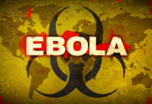 Ebola Scare: Americans Exposed! Biohazard symbol over world map referencing Ebola