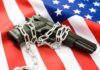 Publix Gun Reversal STUNS Shoppers A handgun wrapped in chains on an American flag
