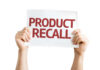 Metal Scare in Premium Ice Cream! Hands holding a sign that reads 'PRODUCT RECALL'