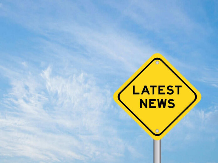 shutterstock_2530090361 Yellow sign with text Latest News on sky background