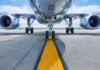 Lithium Battery Rules IGNORED – Flight Chaos! Airplane on runway with visible landing gear engines