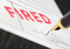 AI Push Results In 10% Job Cut Fountain pen signing document with the word fired