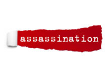 Fake Cop Assassin Pleads Guilty The word 'assassination' printed on a red torn paper background